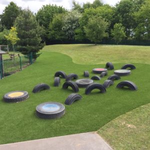 Tyres in artificial grass