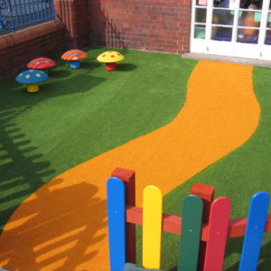 Yellow artificial grass pathway