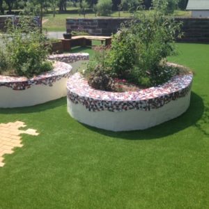 Artificial Grass around planters at Delamere Academy